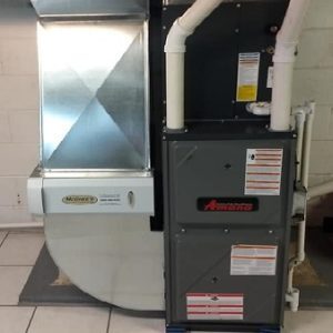 A technician providing heating repair in St. Joseph, MI